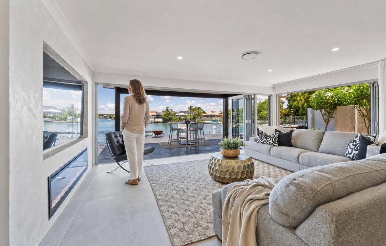 Sherryl Hanlin in a beautifully styled waterfront living room
